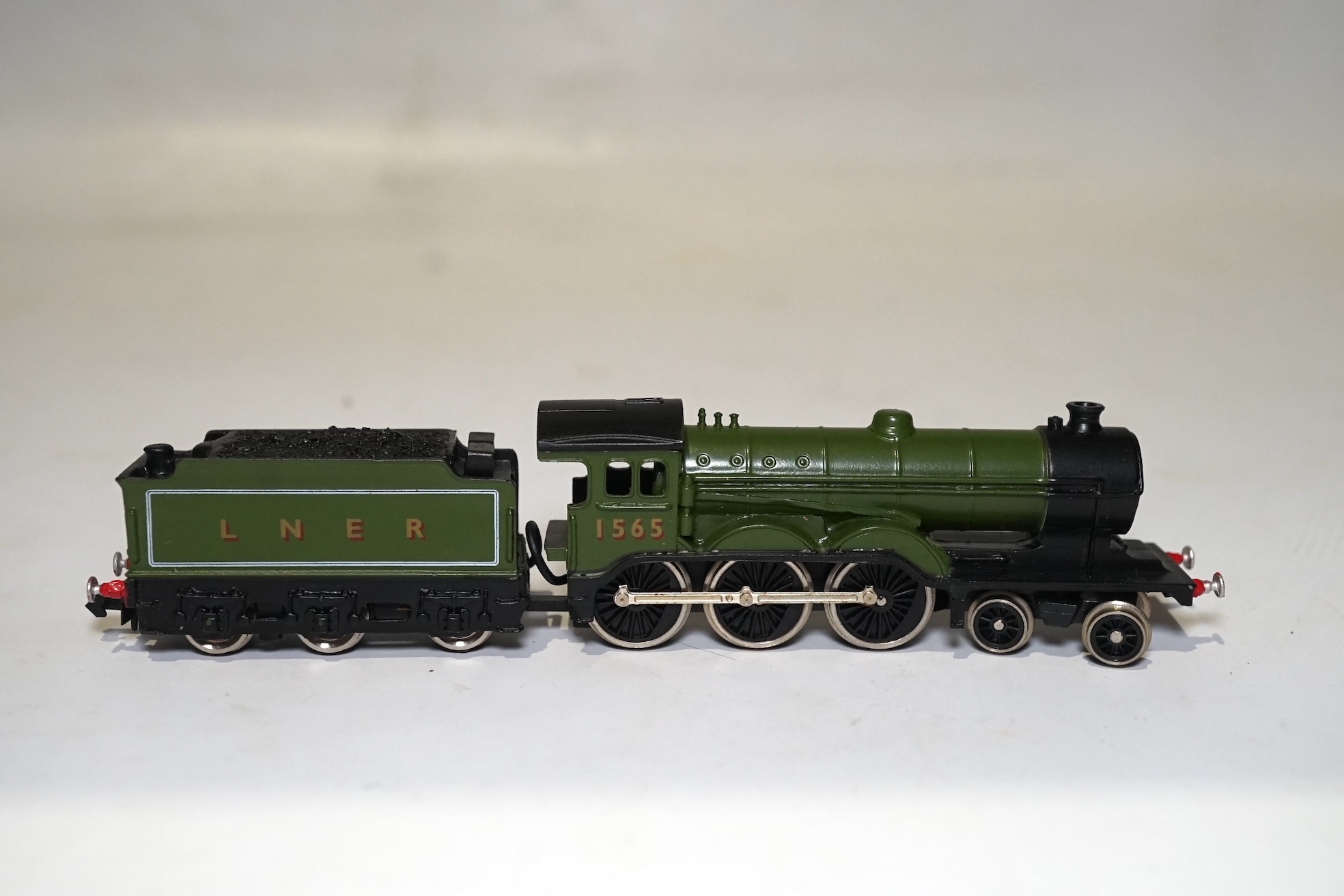 Three boxed Union Mills Models N gauge railway LNER locomotives; a Class B12, 1565, a Class Q2, 3359, and a Class J25, 5650. Condition - good.